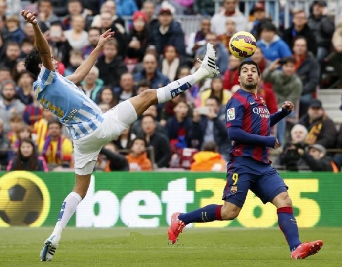 ﻿برشلونة يتجرع من ملقا ما تجرعه ريال مدريد من اتلتيكو .. تحليل