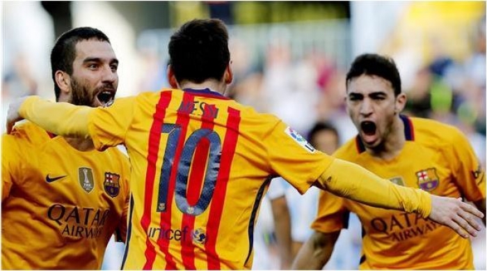 مقصية ميسي تقود برشلونة لتخطي عقبة ملقا بشق الأنفس