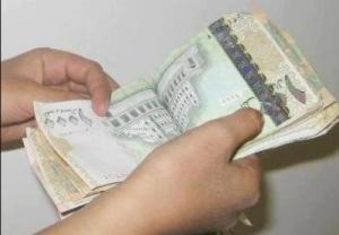الحكومة تقرر شراء الريال اليمني بالدولار عبر البنك الاهلي