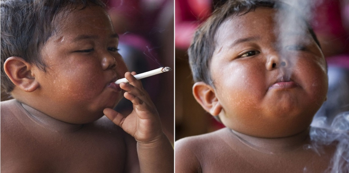 طفل يعالج إدمانه للسجائر بطريقة غريبة ومفيدة (صور)